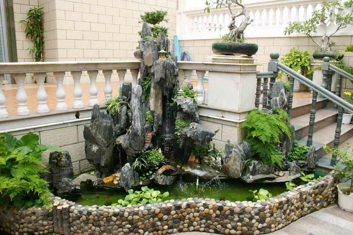 别墅门口挖鱼池风水好吗？鱼池设计对别墅风水有影响吗？