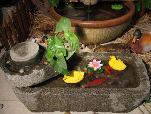 一、石磨的文化内涵与风水象征